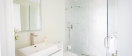 The washroom with a shower, vanity, in an intracoastal View Wellness Residence at the Amrit Ocean Resort