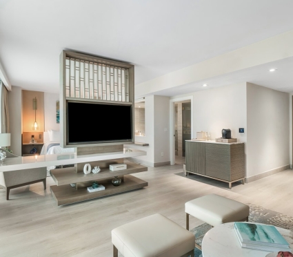 Living space looking into the bedroom space of a junior suite king at Amrit Ocean Resort