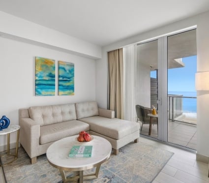 Living area of an ocean view king room at Amrit Ocean Resort