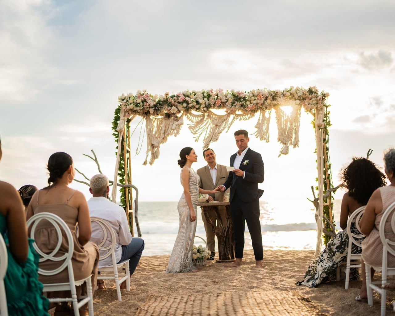 Vow ceremony on the beach at luxurious Amrit Ocean Resort in Singer Island